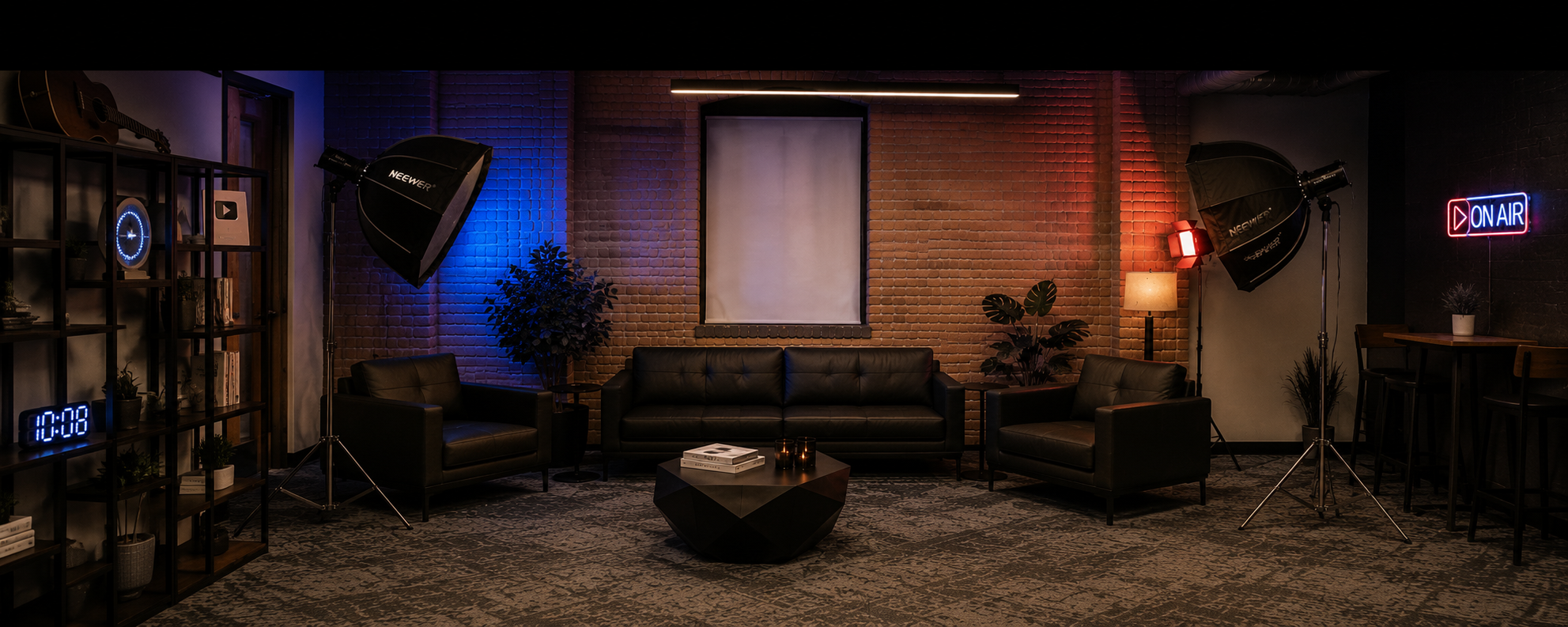 Studio set with exposed brick wall, leather seating and softbox lighting at Cedar Peak Studios in Toronto