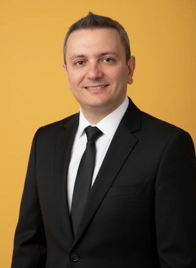 a_professional_studio_portrait_of_the_same_person_from_the_reference_image_keep_the_facial_features_xnofxrrae1mbko1wxxpa_1